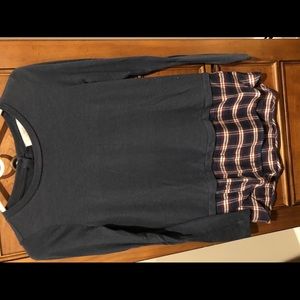 Navy long, long sleeve top with plaid underlay.